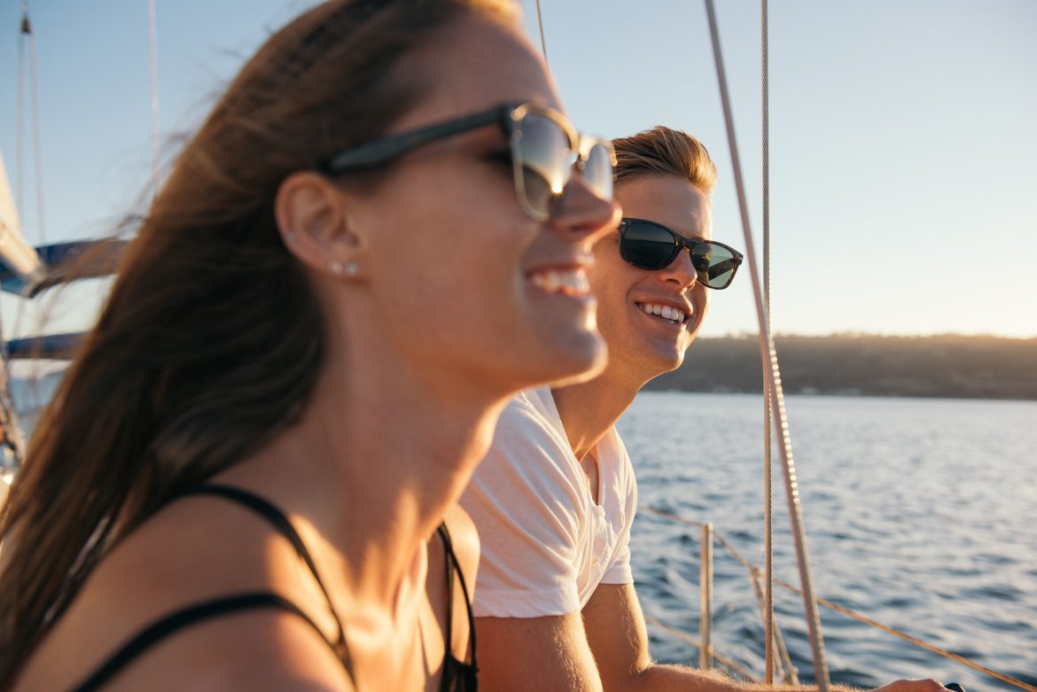 couple enjoying sailboat